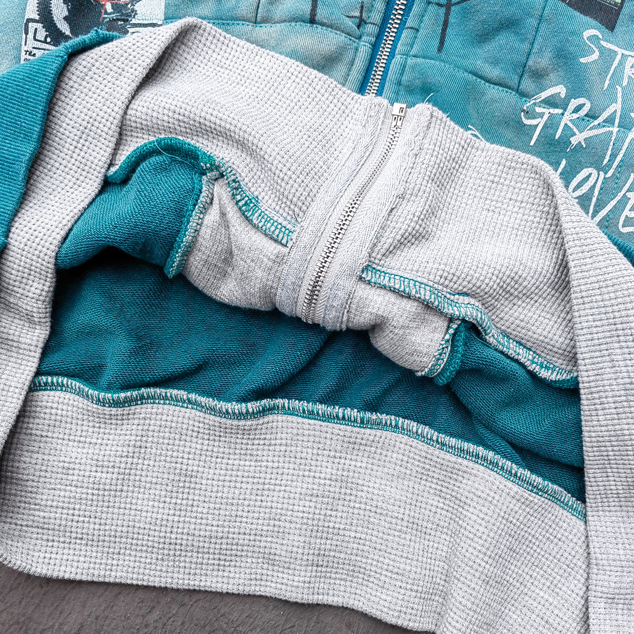 Graffiti Collage Hoodie - Teal Acid Wash Eyelet Hem Y2K Ripped Zip Up Streetwear