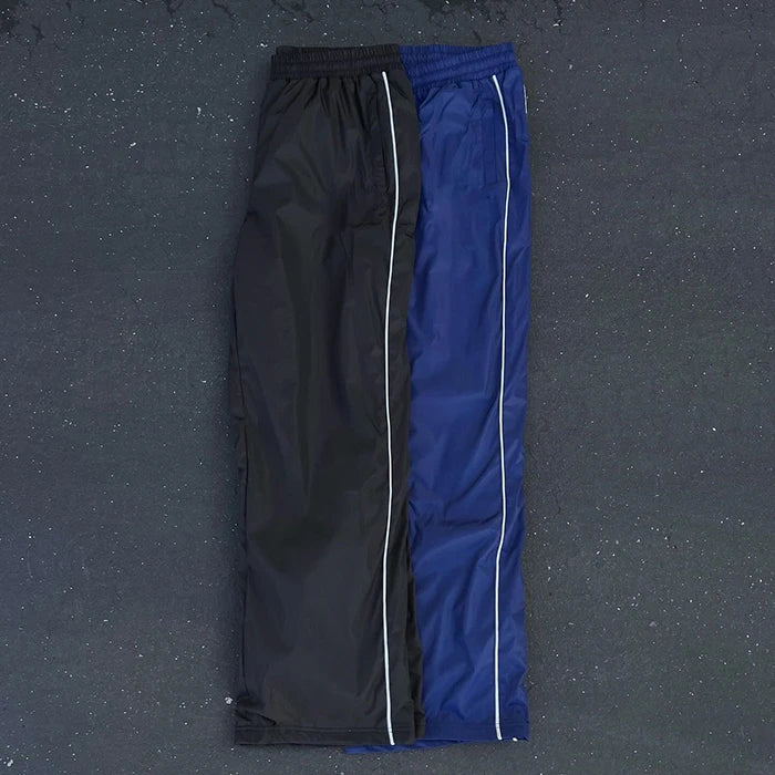 Huili Factory Oem Wholesale Lightweight Nylon Sports Pants Men Custom Piping Design Solid Color Plain Track Pants