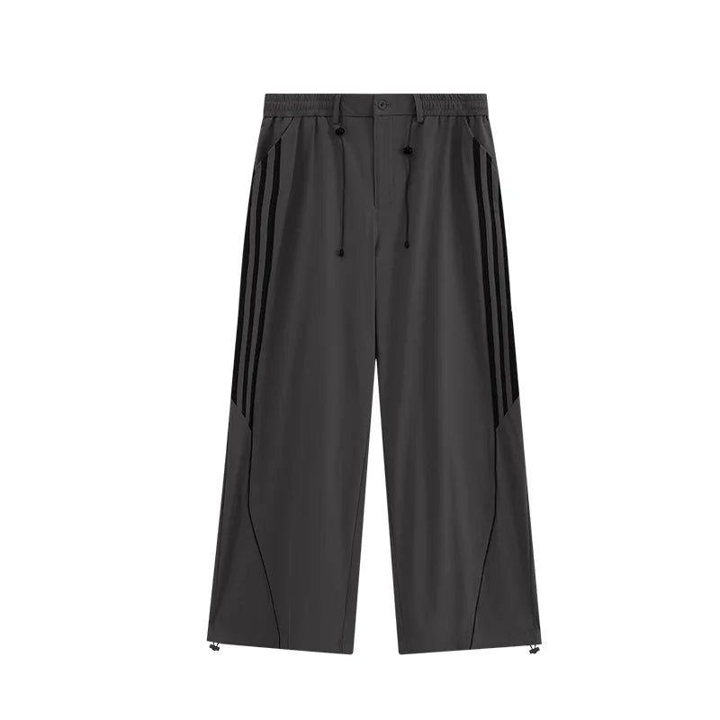 Huilin Oem Wholesale Adjustable Bottom Oversized Track Pants Men Custom Contrast Stripe Baggy Wide Leg Parachute Pants