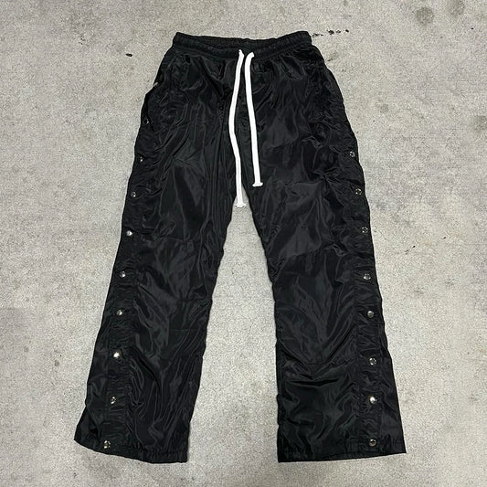 Huilin Custom Loose Pants Solid Color Wide Leg Track Pants Drawstring Waist Men Custom Snap Button Side Nylon Pants