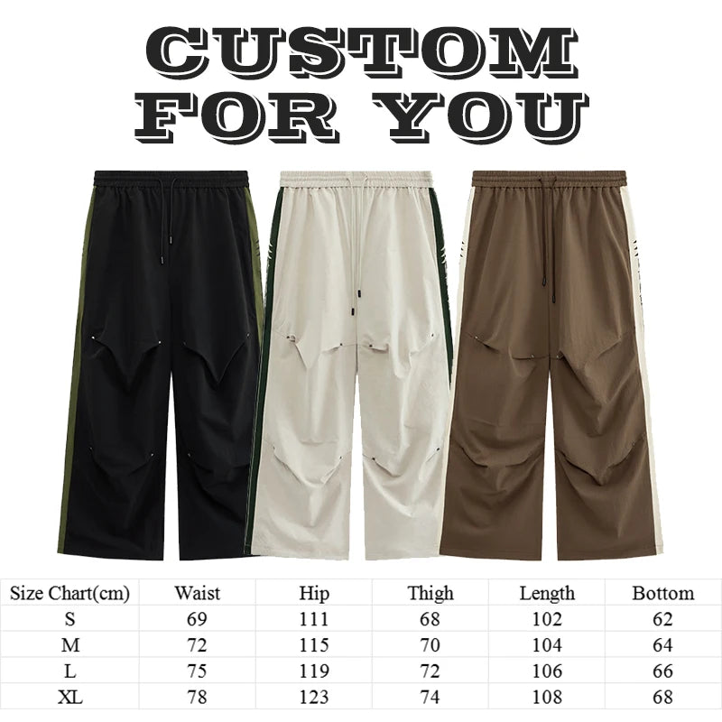 Huilin Hot Selling Oversized Fit Cargo Track Pants Men Custom Side Stripe Straight Wide Leg Baggy Parachute Pants