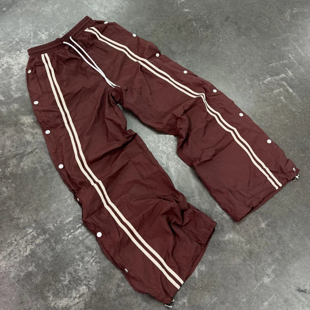 Huilin Manufacturer Oem Elastic Waist Unisex Nylon Pants Custom Striped Men Snap Button Side Wide Leg Track Pants