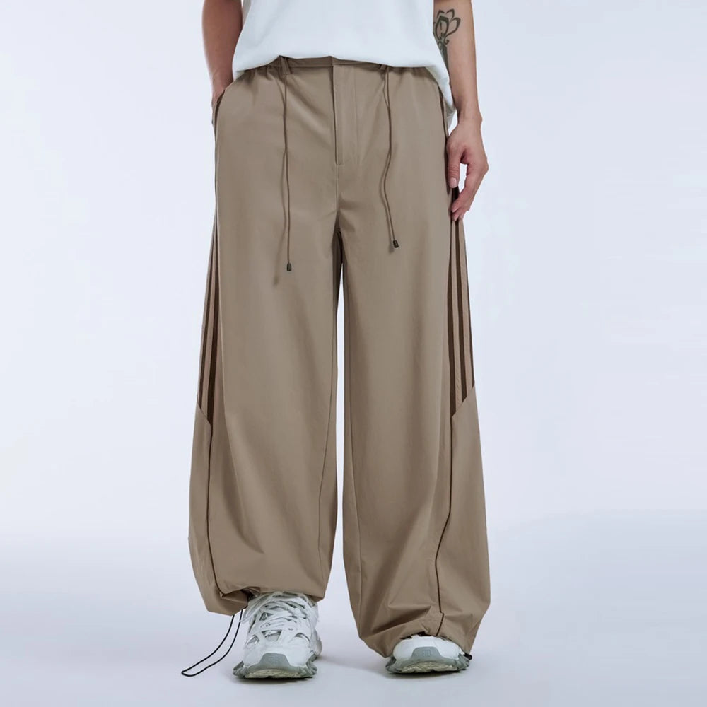 Huilin Oem Wholesale Adjustable Bottom Oversized Track Pants Men Custom Contrast Stripe Baggy Wide Leg Parachute Pants