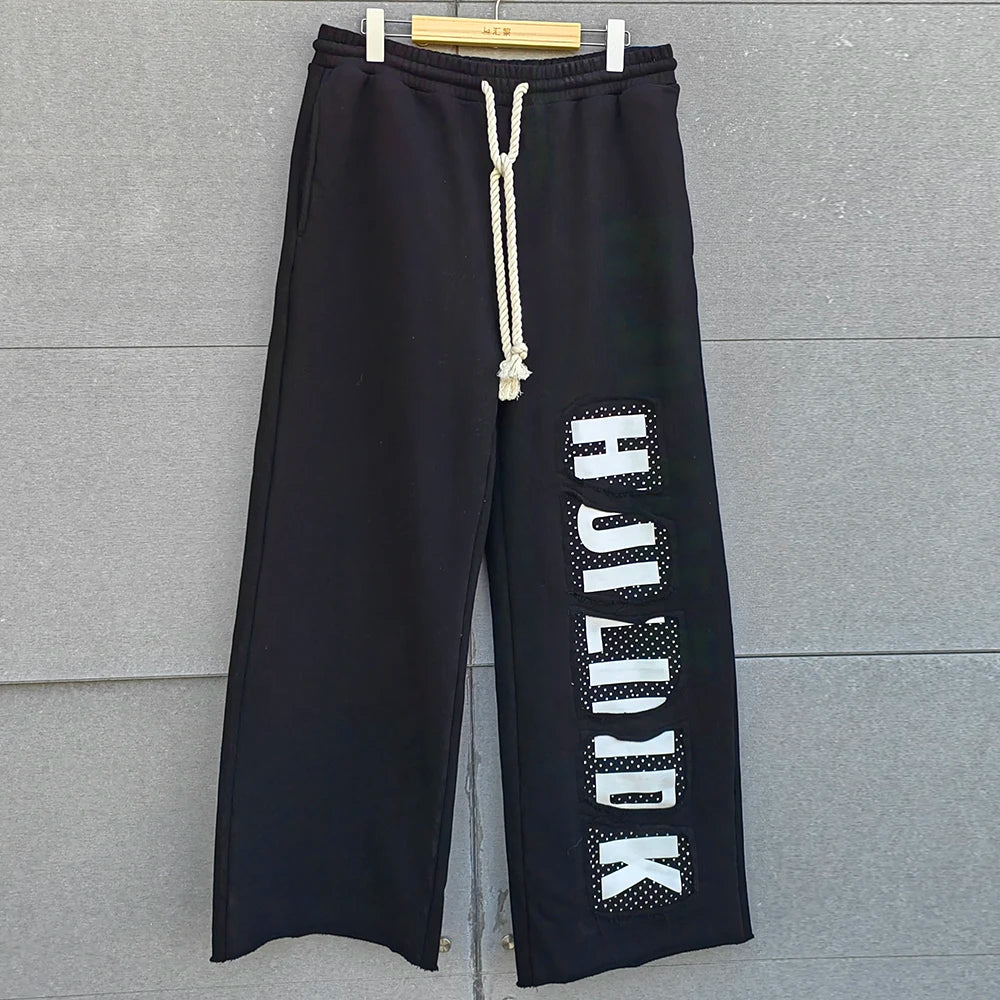 Huilin Custom Streetwear Oversized French Terry Cotton Track Flare Pants Screen Printed Men Wide Leg Rhinestone Baggy Sweatpants