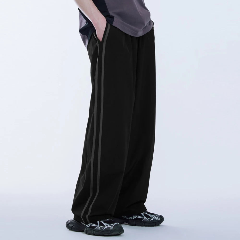 Huilin Low Moq Wholesale Drawstring Waist Straight Leg Unisex Sportswear Pants Men Custom Side Striped Wide Leg Track Pants