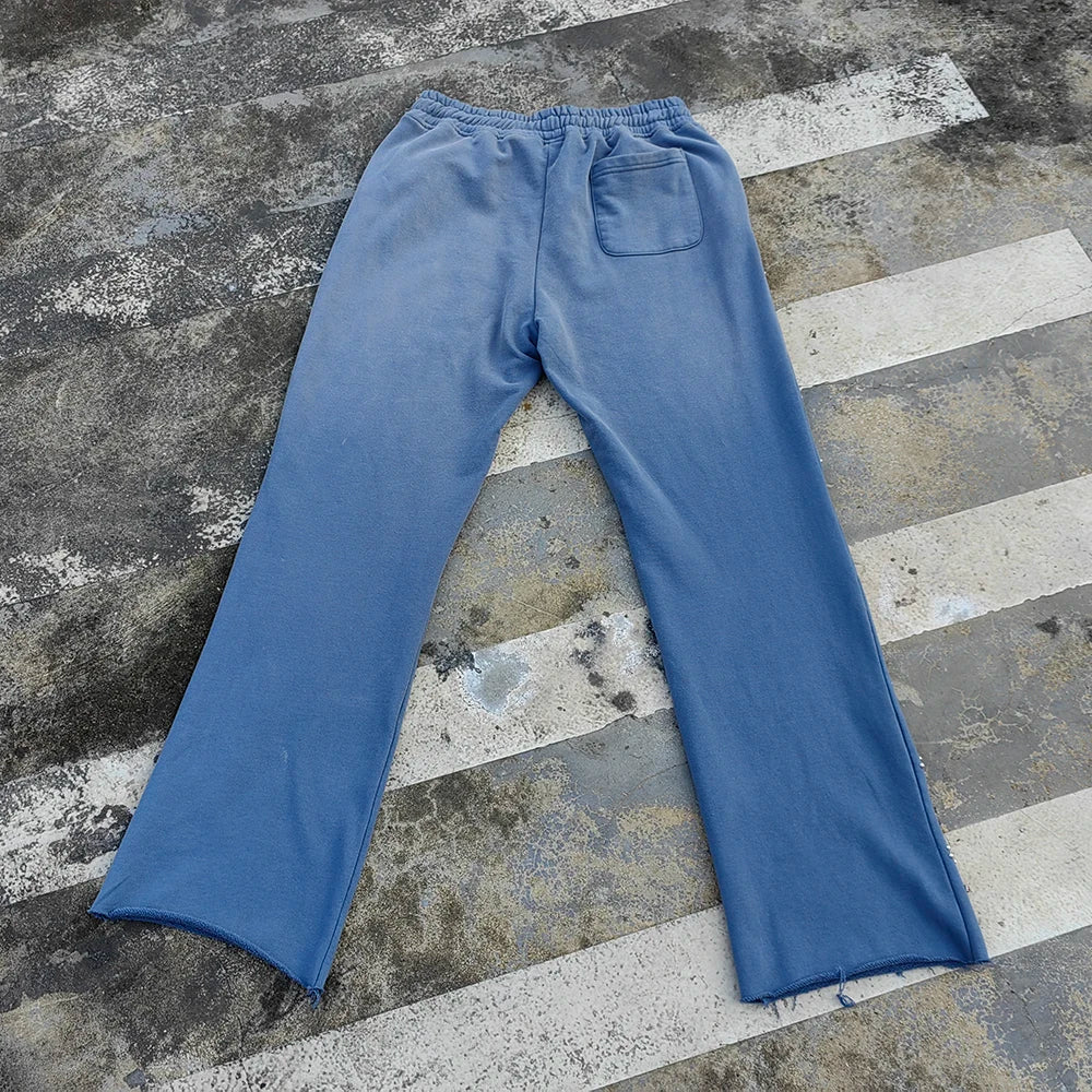 Huilin Factory Oem Vintage Sun Faded Washed Thick Cotton Track Pants Men Custom Raw Hem Bottom Flared Leg Rhinestone Sweatpants