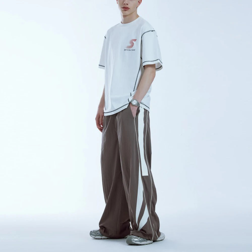 Huilin Oem Custom Color Block Sportswear Track Pants Men Oversized Fit Baggy Wide Leg Lightweight Pants