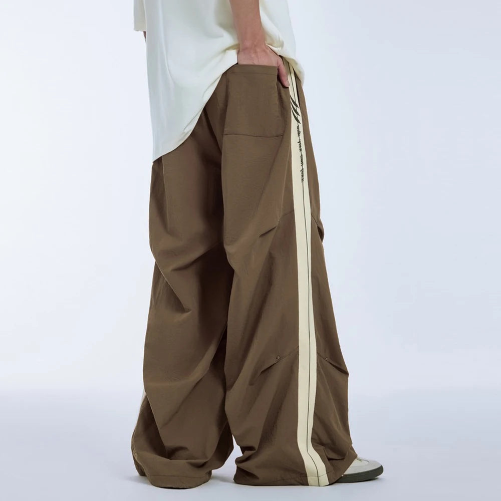 Huilin Hot Selling Oversized Fit Cargo Track Pants Men Custom Side Stripe Straight Wide Leg Baggy Parachute Pants