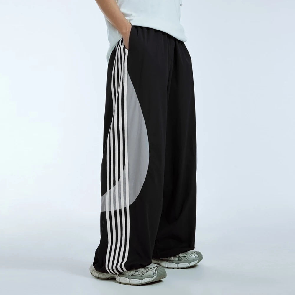 Huilin Summer New Trend Unisex Oversized Water Resistant Sportswear Pants Men Custom Stripe Side Baggy Widd Leg Track Pants