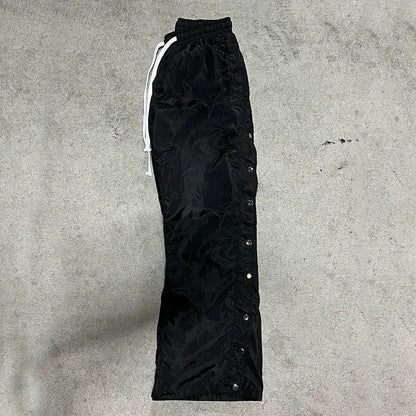 Huilin Custom Loose Pants Solid Color Wide Leg Track Pants Drawstring Waist Men Custom Snap Button Side Nylon Pants