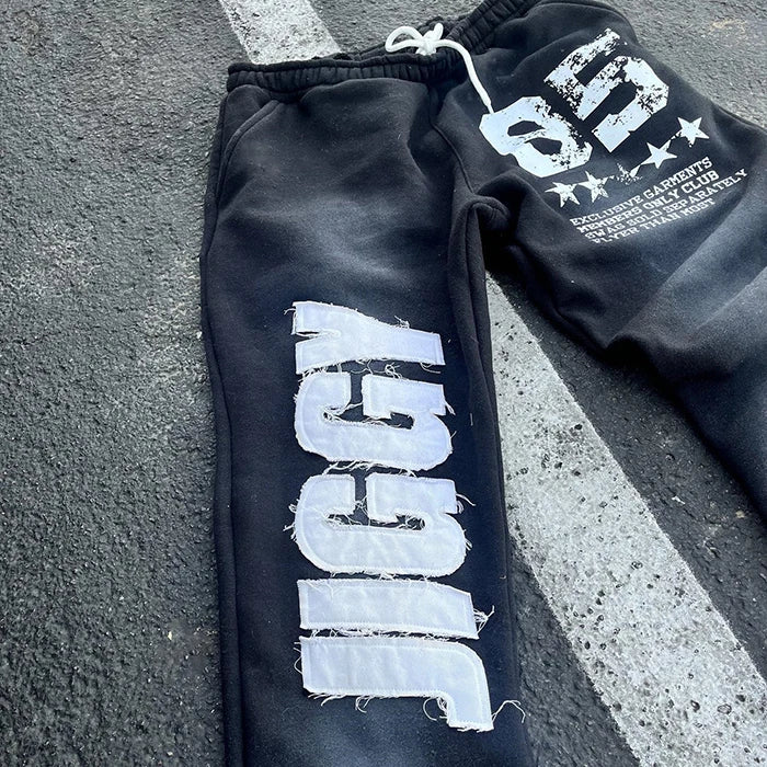 Huilin Oem Custom Logo Printing Flared Sweatpants Men Distressed Embroidery Logo Patched Sun Faded Vintage Washed Sweatpants