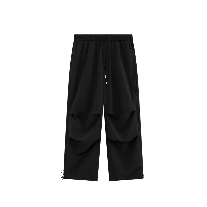 Huilin New Arrival Side Zip Design Oversized Fit Unisex Nylon Track Pants Elastic Waist Men Baggy Wide Leg Parachute Pants