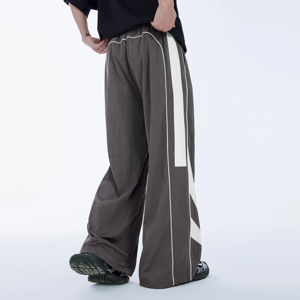 Huilin Oem Custom Color Block Sportswear Track Pants Men Oversized Fit Baggy Wide Leg Lightweight Pants