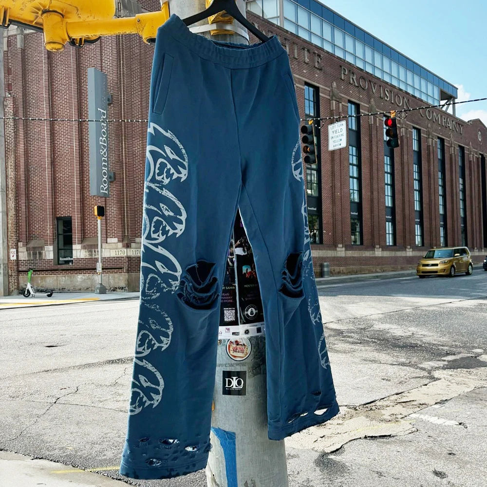 Huilin Oem Distressed Vintage Washed Ripped Bottom Track Pants Men Custom Logo Screen Printing Thick Cotton Wide Leg Sewatpants