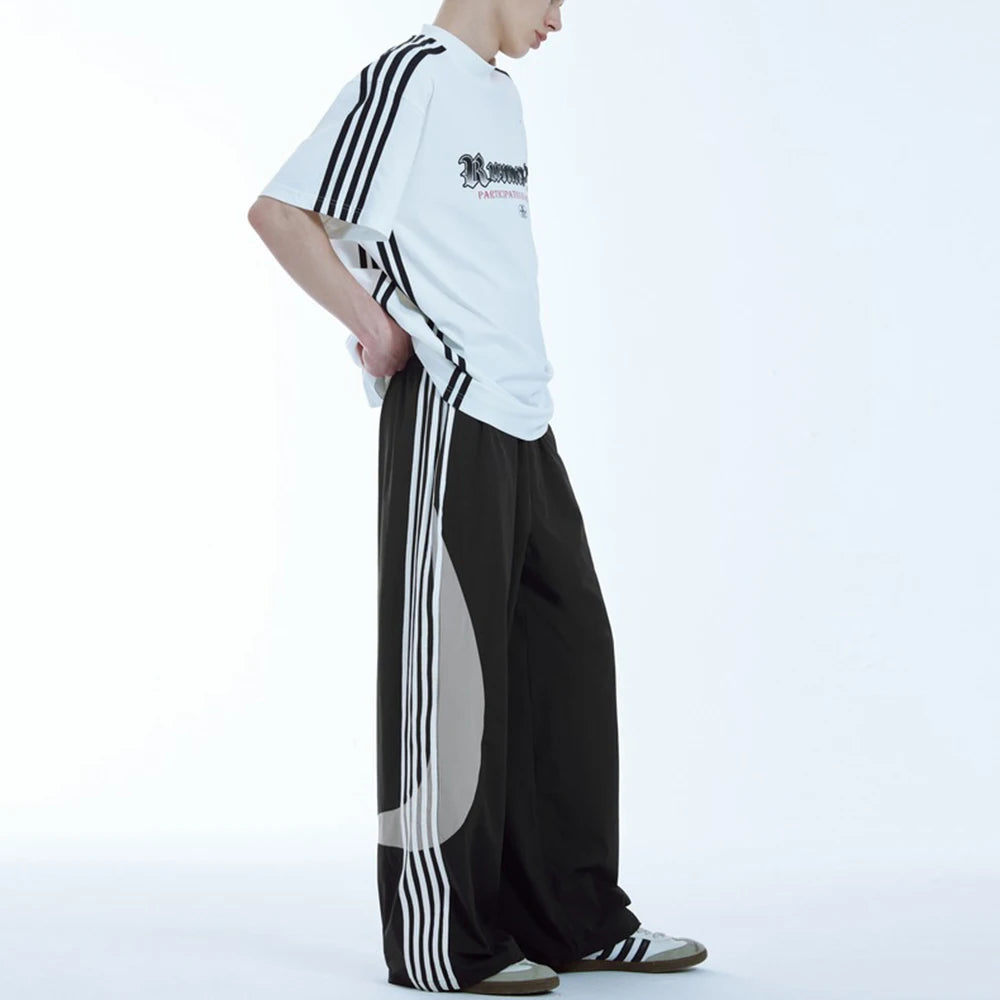 Huilin Summer New Trend Unisex Oversized Water Resistant Sportswear Pants Men Custom Stripe Side Baggy Widd Leg Track Pants