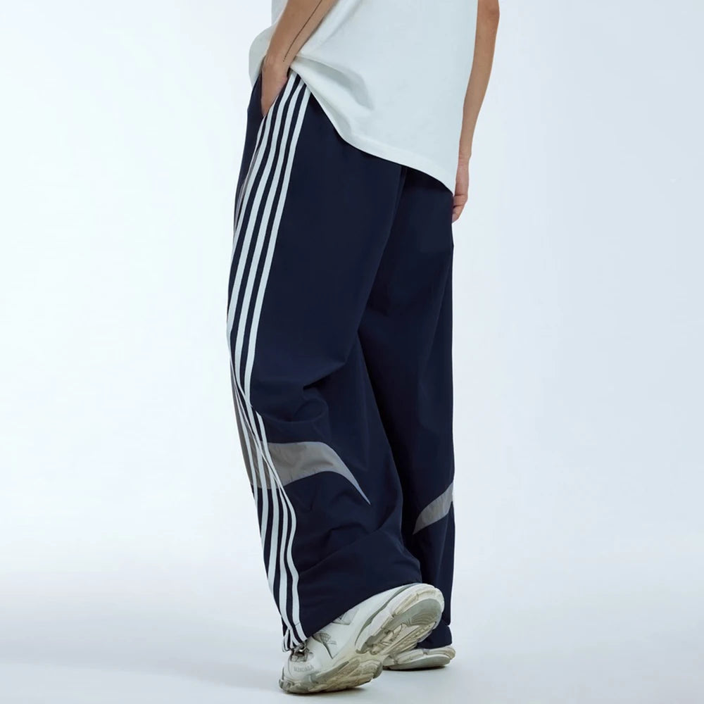 Huilin Summer New Trend Unisex Oversized Water Resistant Sportswear Pants Men Custom Stripe Side Baggy Widd Leg Track Pants