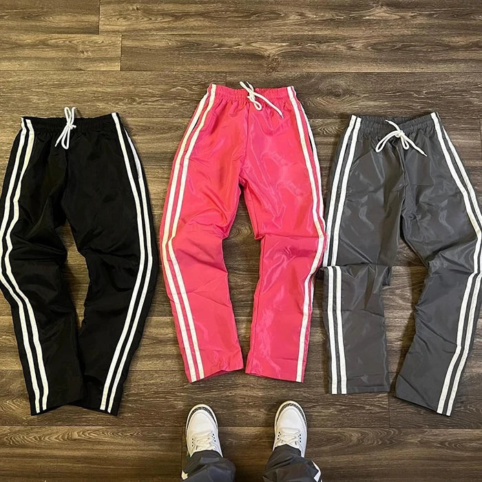 Huilin Factory Hot Selling Drawstring Waist Straight Leg Sweatpants Men Custom Striped Side Sportswear Nylon Track Pants