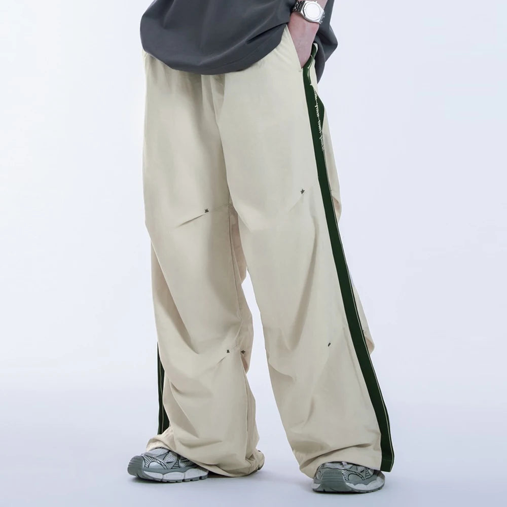 Huilin Hot Selling Oversized Fit Cargo Track Pants Men Custom Side Stripe Straight Wide Leg Baggy Parachute Pants