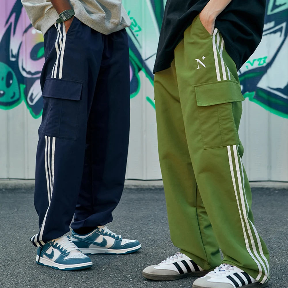 Huilin New Trend Streetwear Polyester Cargo Parachute Pants Side Striped Men Custom Baggy Wide Leg Oversized Track Pants