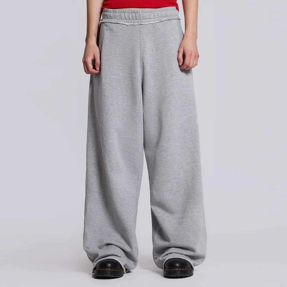 Huilin Oem Custom Vintage Washed Unisex Oversized Fit Heavyweight Cotton Sweatpants Jogger Raw Hem Men Wide Leg Baggy Sweatpants