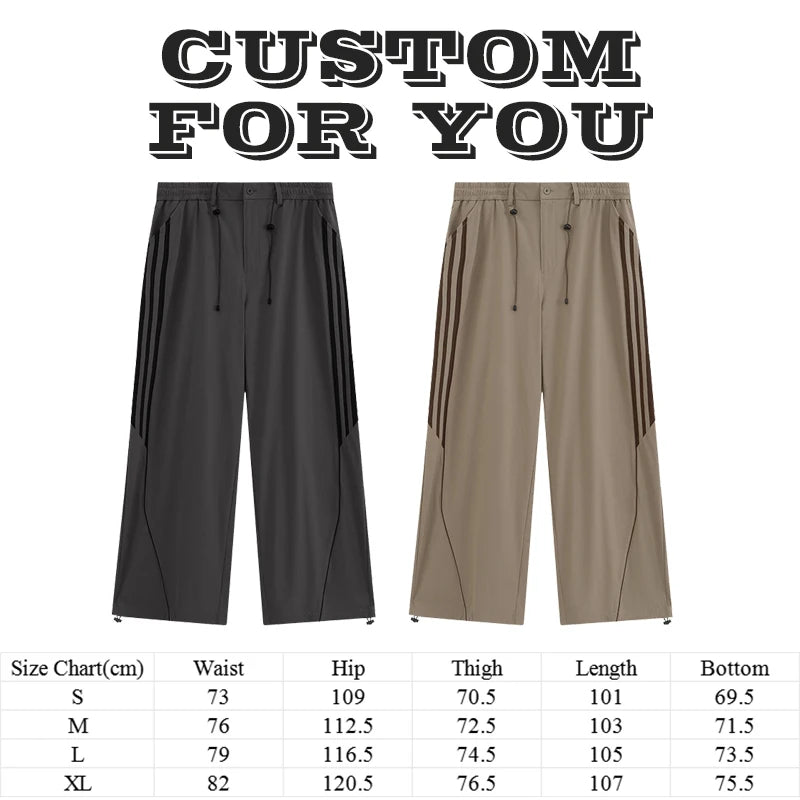 Huilin Oem Wholesale Adjustable Bottom Oversized Track Pants Men Custom Contrast Stripe Baggy Wide Leg Parachute Pants