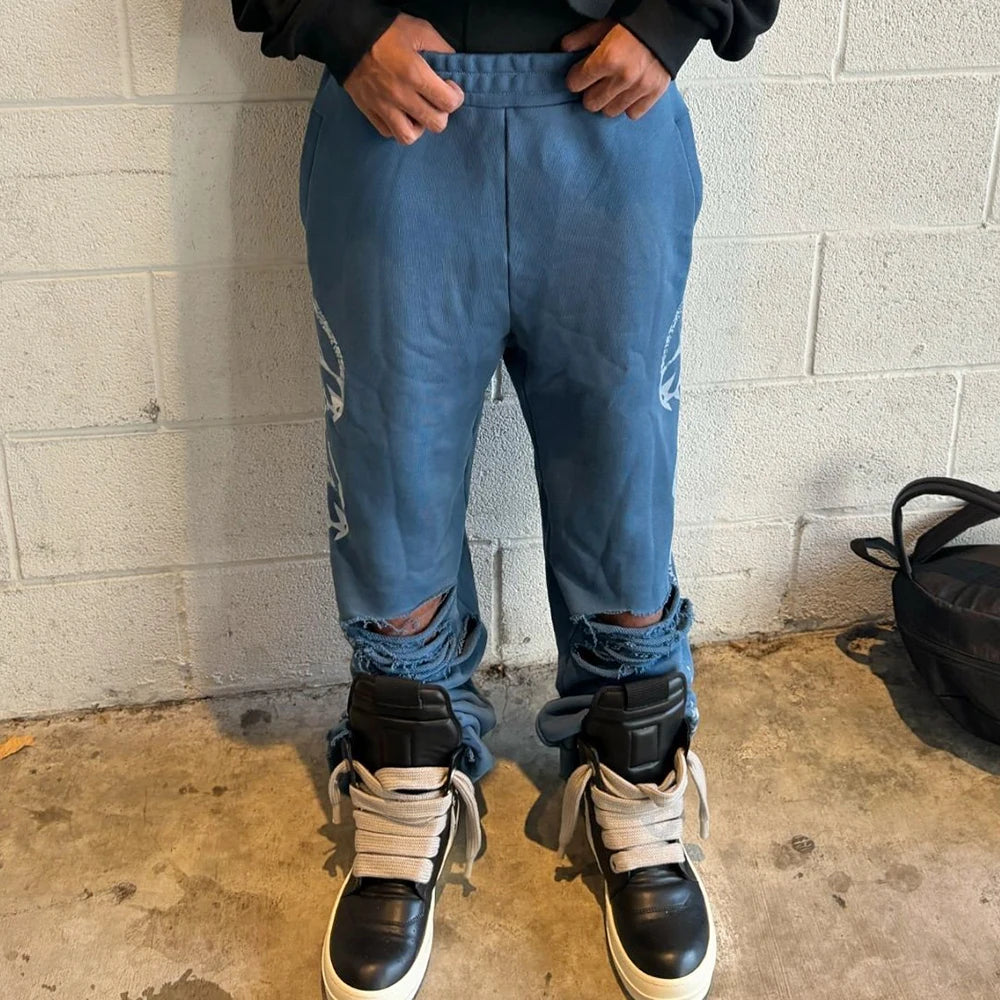 Huilin Oem Distressed Vintage Washed Ripped Bottom Track Pants Men Custom Logo Screen Printing Thick Cotton Wide Leg Sewatpants