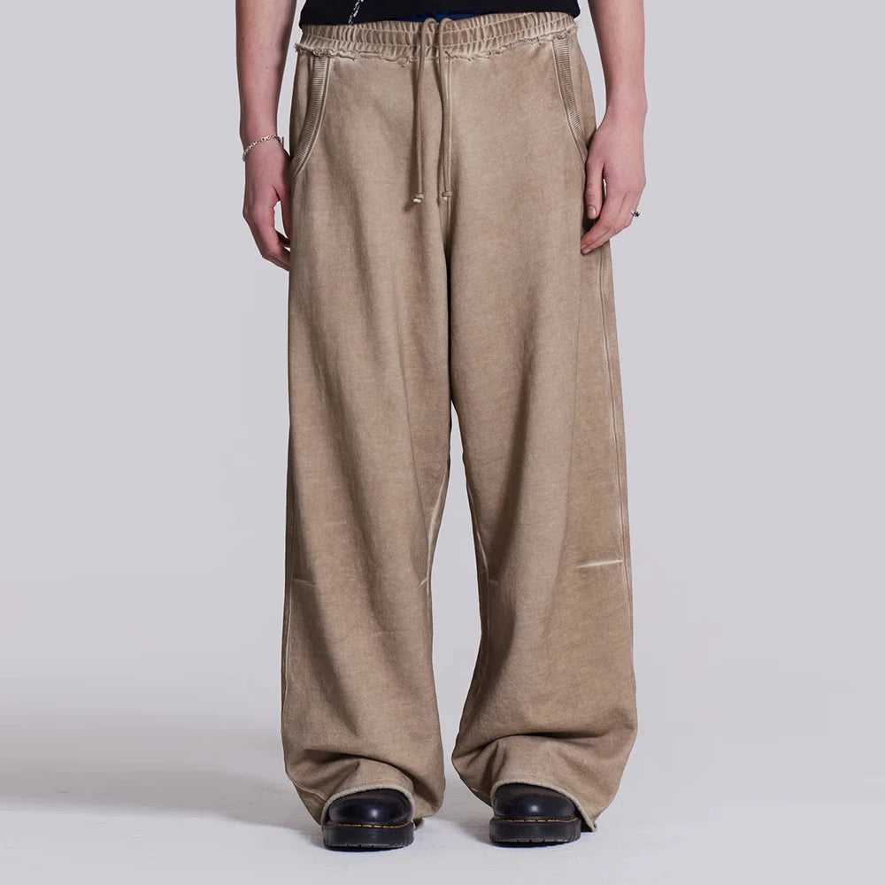 huilin oem high street oversized unisex heavyweight sweat pants elastic waist solid color men baggy wide leg raw hem sweatpants