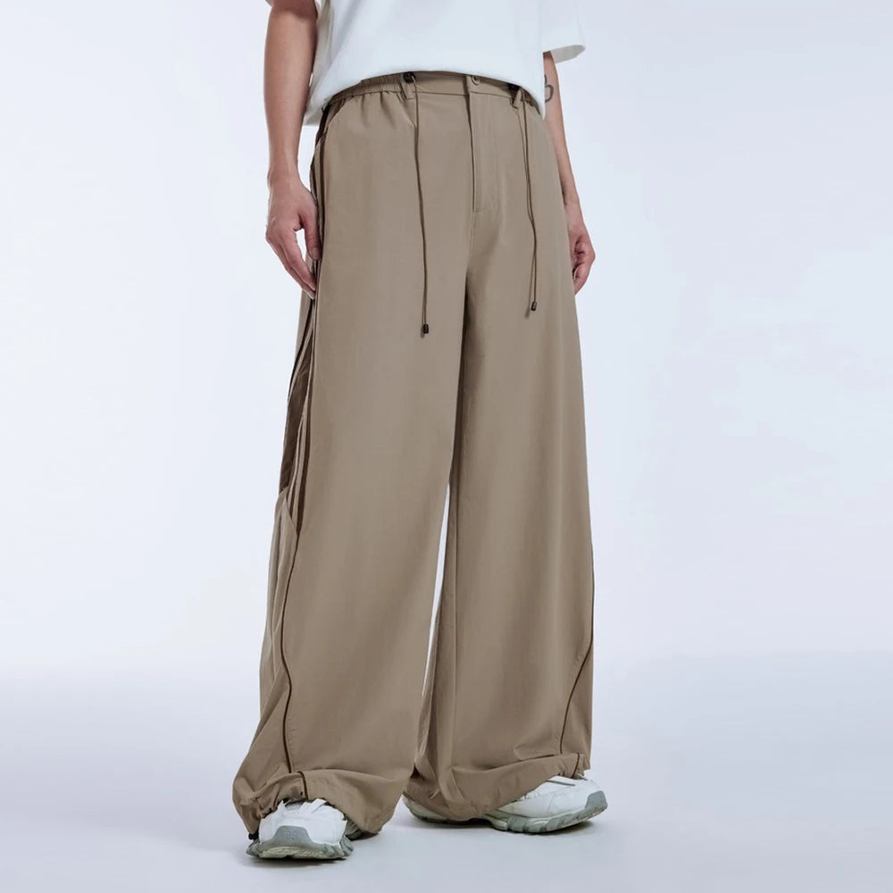 Huilin Oem Wholesale Adjustable Bottom Oversized Track Pants Men Custom Contrast Stripe Baggy Wide Leg Parachute Pants