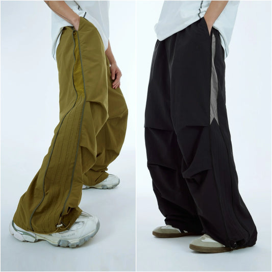 Huilin New Arrival Side Zip Design Oversized Fit Unisex Nylon Track Pants Elastic Waist Men Baggy Wide Leg Parachute Pants